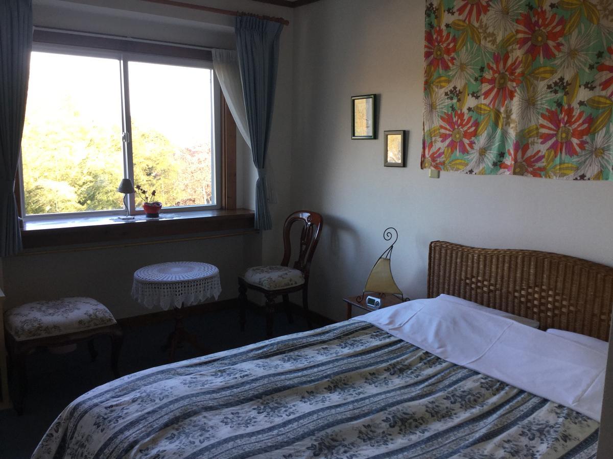 Chiisana Hotel Hanaikada Іто Номер фото